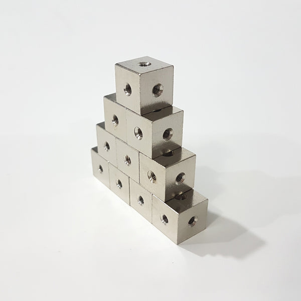 12 mm metal cube, threaded M3 on all axes. Perfect for modding your computer case, or creating custom cases!